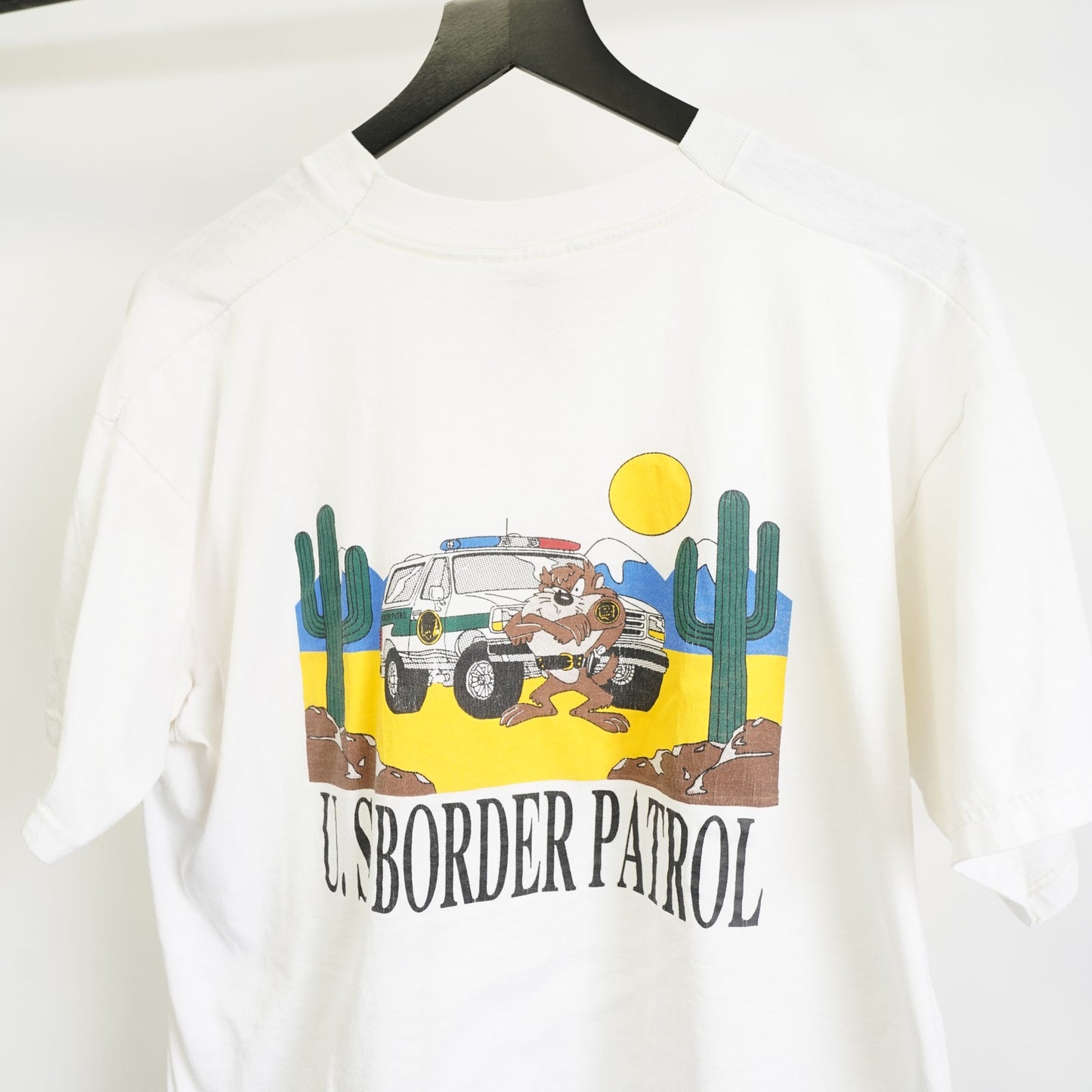 (XL) Vintage U.S. Border Patrol Taz Looney Tunes T-Shirt Men's XL White 90s