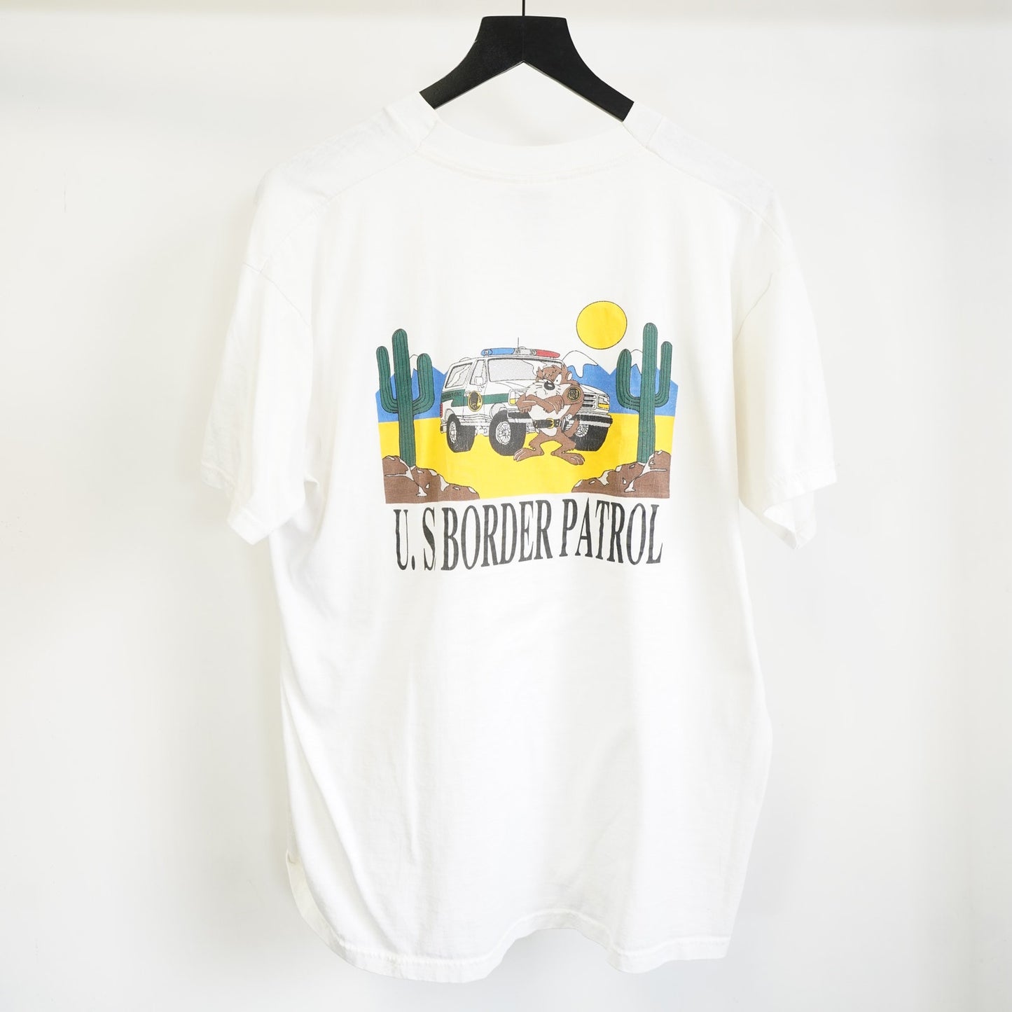(XL) Vintage U.S. Border Patrol Taz Looney Tunes T-Shirt Men's XL White 90s